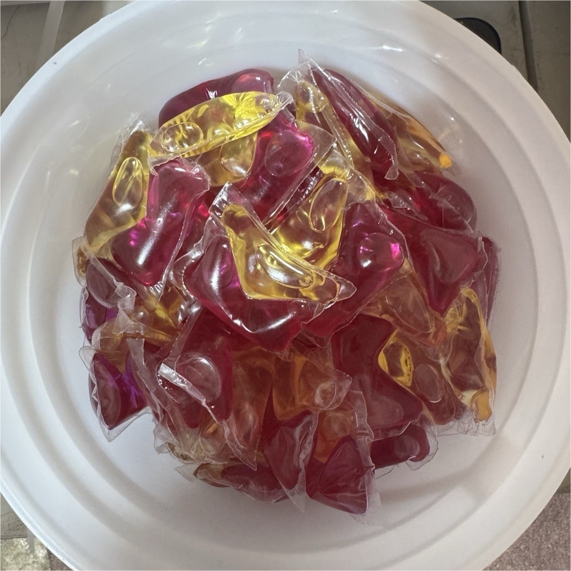 Laundry Detergent Capsules Red Yellow Assorted Colors Plastic Bucket
