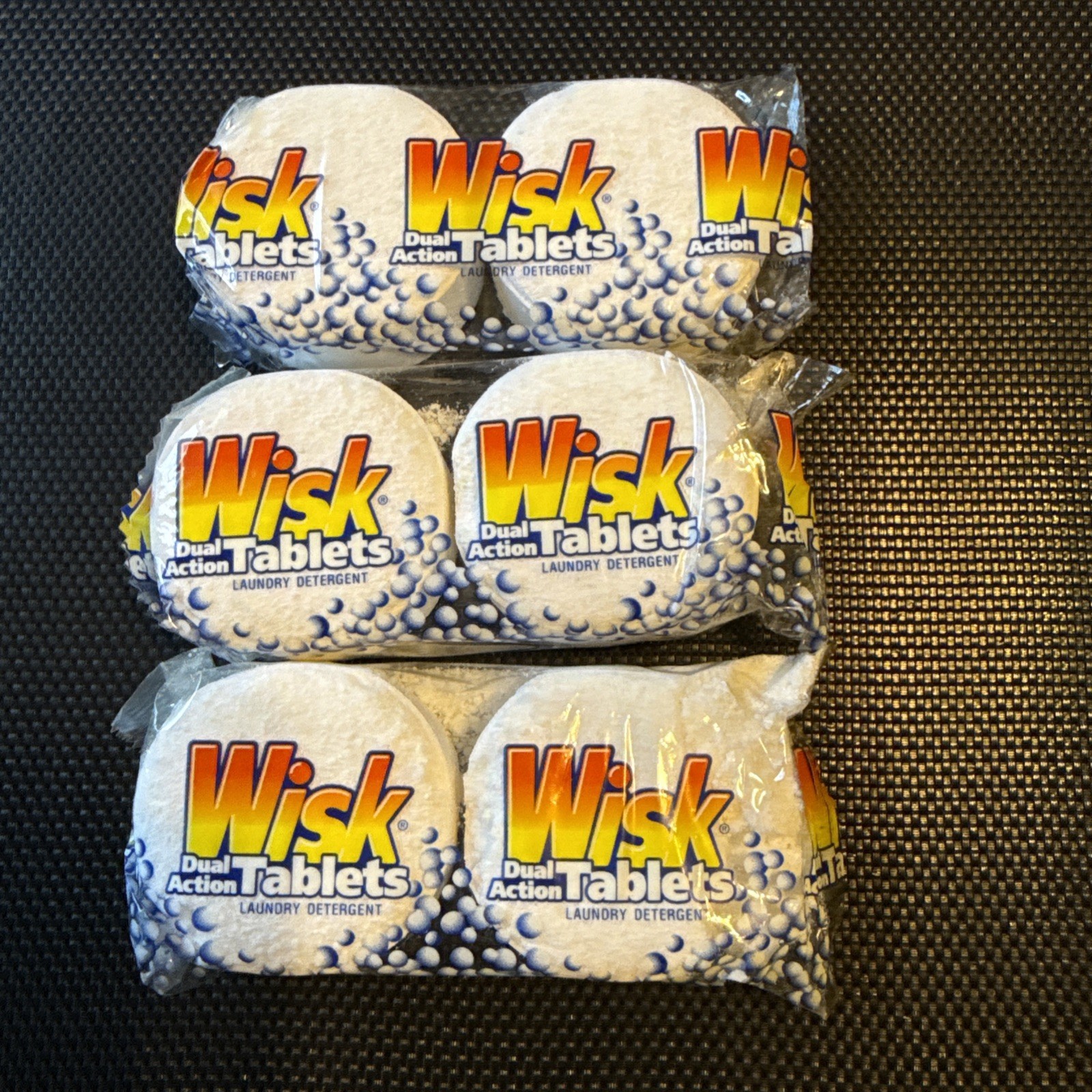 Wisk Dual Action Laundry Detergent Tablet quantity 3 packs of 2 each.