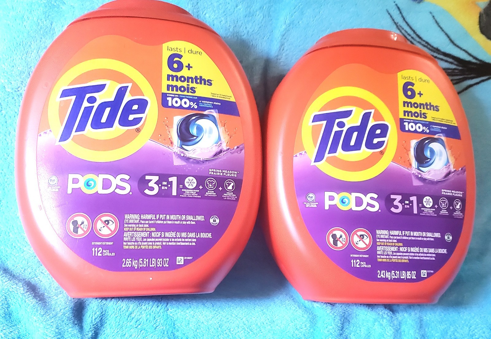 Two 3 in 1 Spring Meadow Scent Liquid Laundry Detergent Pods, 112-Count Each.